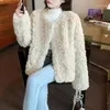 Pelliccia femminile in stile coreano giacche di lana di agnello da donna beige sciolte sciolte ladies ladies fashion tasche di peluche