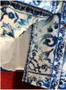Kvinnors dikerockar SvoryXiu Designer Autumn Winter Vintage Blue and White Porcelain Långärmad knapp LACE UP LOOSE 230815