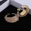 Brincos redondos da marca Mulheres personalizadas Círculo vintage Hollow rebites 18K Brincos simples de vidratórios de ouro Acessórios de jóias clássicas de luxo