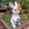 Decorazioni da giardino prendere il bollitore con farfalla a farfalla solare ornamenti in resina figurine per esterni artigianato