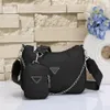 Nylon axelväska för kvinnor lyxiga designer väskor på kvinnliga mode crossbody handväskor messenger hobo handväska plånböcker253l