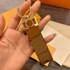 Luxury Brand Classical Keychain Gold Buckle Women Men Leather Keychains Lady Bag Car Key Pendant Flera stilar Keys med låda