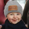 M610新しい秋の冬の赤ちゃんの子供を編む帽子ミニレター子供スカルビーニーキャップウォームウールの帽子