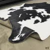 Tapijten Noordse Amerikaanse stijl Zwart en wit koe Patroon Cowhide Tapijt Woonkamer Sofa Area Tapijt Slaapkamer Decor voetmatten Leer