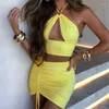 Werkjurken Hollow Out Two -Piece Set Halter Crop Top en Drawstring Mini Skirts 2 stuks sets vrouwen 2023 Zomer slanke outfits