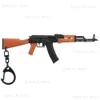 AK47 Mini Tüfek Tabancası Keychain 1 9 Minyatür Oyuncak Taban Keyasyon Şekli Tabanca Kolye Süsleme Hediyesi Ordu Fan Koleksiyonu T230816