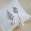 Moda Lady Angel Wings Crystal sztuczna perła wisiorek Asymetryczne kolczyki