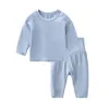 Set di abbigliamento 2023 Born Abiti per bambini Set di magliette modali solidi Pantaloni maniche lunghe Dormi Indossare ragazzi per neonati ragazze 6-24 mesi