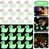 Dekorativa föremål Figurer 200st. Mini Lysande ankor hartshartar Tiny Glowing Animal Figures Glow in the Dark Cute Garden Decor Float Duck Baby Bath Toys 230816