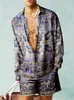 Мужские спортивные костюмы мужчины устанавливают печатные лоскутные отвороты с коротким рукавом. Рубашка для рубашки пляжные шорты летняя уличная одежда гавайских костюмов мужчин S-5XL 230815