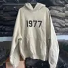 Erkek Hoodies Sweatshirt Stock Fleece Essentials Hoodies 1977 Flocked Lee Sis Kapşonlu Pullover Hiphop Street Büyük Boyutlu Erkek ve Kadın Sweatshirt Z230817