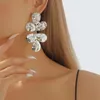 Kolczyki Dangle Exburbled Metal Flower Plirzone kolczyki dla kobiet koniczyna ucha upuszczenie mody biżuterii