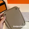 Bolso de cubo de diseñador Bolsos de marca Bolso de viaje de cuero genuino Hebilla dorada o plateada Correa gruesa Bolso de mano de lujo Bolsos de compras de diseñador Playa