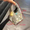 Kvällspåsar HANDLA S ANVÄNGNINGSKOPPNING PAGAR OCH HANDBAG Luxur Designer Hobo Shoulder Bag Shiny Crystal Clutch Purse Bucket Bag 230815