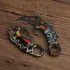 X73 Karambit Knife 440Cチタンコーティングブレードスチールハンドル戦術的な爪折りたたみナイフ屋外EDCポケットツール