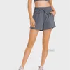 Lu Moisture Wicking Sweat Wicking Water Cooling Shorts med dragkonst i midjan Lätt och andningsbara sport Hot Pants Kvinnor utomhussport Tennisuppsättning byxor