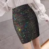 Scherma di gonfie scintillanti con paillettes a vita corta con gonna corta primavera estate 2023 slim sexy wrap wrap abbigliamento alla moda