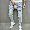 Herr jeans 2023 mode män hål avslappnade mager byxor streetwear manlig stilig rippad solid hiphop smal denim byxor