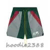 RHUDE green Europe and the United States fashion brand color matching micro standard tethered casual shorts men and women high street beach sports five quarter pants