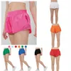 Verão lulus yoga quente short quente esportes de secagem rápida respirável luluslemens bolso de bolso de fitness calças de fitness príncipes sportswear ginásio