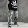 Mens Pants High Street Hiphop Kişilik Graffiti Büyük boy kot pantolonlar ins marka gevşek düz pantolon yırtık pantolon 230815