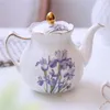 Mokken Iris Printing Cup Saucer Europeaan Keramische koffiemok Pot Home Elegante theeset Originele ontbijtbekers Geschenkdoos Drink 230815