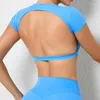 Aktiva skjortor Sexig backless Crop Top Short Sleeve Yoga Shirt Kvinnor Tätt snabb torr träning Toppar Fitnesskläder Gym slitage T-shirts