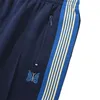 Calça masculina agulhas awge homens mulheres 1: 1 alta qualidade borboleta bordada fita lateral casual azul royal