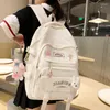 Bolsas escolares mochila garotas de desenhos animados fofos com brinquedos e pinos de moda crianças adolescentes escolar