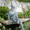 Objetos decorativos Figuras de escultura de fadas de flores de jardim de jardim de paisagismo Arte do pátio Ornamento Resina Turek estátua sentada ao ar livre angel girl artes de artesanato 230815