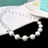 Новая спроектированная мода 925 Silverluxury White Shell Pearl маленькая круглая трубка для одиночной петлевой колье титанового стального дизайнер