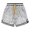 2024SS 디자이너 반바지 Rhude Shorts Mens 메시 짧은 농구 패션 해변 탄성 밴드 바지 남자 고품질 거리 착용 빨간색 블루 블랙 보라색 바지