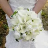 Bruiloft bloemen ivoorrozen met calla lelies ronde boeket bruids bloem zijden stoffen mariee