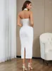 Casual jurken vrouwen sexy wit uit schouder halter mouwloze holle out midi bandage elegante kwamen 2023 bodycon avond feestclub jurk