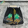 Mäns shorts kokosnöt träd bokstäver tryck strand rhude shorts sommar män kvinna 1 1 casual sand dragkonstbyxor enkel snabb torkning 230816