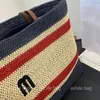 Bolsos de playa para mujeres de diseñador Bolso de la playa Personalidad personalidad de cuero genuino de alta calidad atmósfera minimalista Bolsa tejida