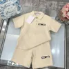 Suits de survêtement pour enfants Designer Baby Clothes Sumy Signit Taille 100-150 cm 2pcs Polo Neck Court à manches courtes et shorts imprimés sur le logo Juin 20 juin