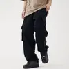 Pantaloni maschili di colore solido uomo pantaloni streetwear cargo sciolto in forma multipla design elastico in vita elegante