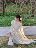 Повседневные платья шифоновое платье французское премиум -длинное белые женщины элегантные пузырьковые рукава Сниженная обмотка нежная сказочная шорт