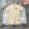 Suits de survêtement pour enfants Designer Baby Clothes Sumy Signit Taille 100-150 cm 2pcs Polo Neck Court à manches courtes et shorts imprimés sur le logo Juin 20 juin
