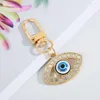 Keychains Lucky Eye roestvrij staal sleutelhanger modezak hangduivel devil's sleutelende vrouwen mannen auto sleutelhang kettingpaar accessoires