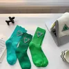 2022 Spring/Summer Black and White Letter Women's Mid length Socks ins Tidal Triangle Simple College Style Pure Cotton Green Socks