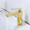 Rubinetti del lavandino da bagno leggero ruscello del bacino rame di lusso in oro nero lavaggio a lavaggio singolo creativo ed estensione fredda