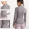 Sense desnudo Fitness seco rápido Running Yoga Slimmming Women Collar de pie Long manga Top