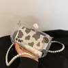 Worki wieczorowe 2023 Modna przezroczysta akrylowa pudełko Tourse kobiet przezroczystą torebkę plastikową torbę w kształcie lufy impreza dziewczyna z łańcuchem perłowym 230816
