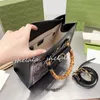 2023 glinsterende bamboe schoudertassen designer tas crossbody tas vrouw reisbakken portemonnees handtas lederen glanzende pailletten 5a