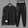 Мужские спортивные костюмы 2023 Спортивные костюмы мужские брюки с капюшоном 2 штука Соответствующие наборы одежды для мужской одежды.