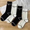 Socks & Hosiery Designer Solid Color Stockings Ladies Letter Black and White Line Fashion mid-calf socks INS Casual Simple Couple NAFI