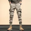 Herenbroek 2023 Man Spring herfst tactische militaire vrachtmannen buiten werkmachines mannelijke slanke multi pocket broek f141