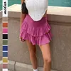 Kjolar solid färg kvinnors sommar mode veckad kjol streetwear all-match sexig krydd lotus blad rosa/vit mini